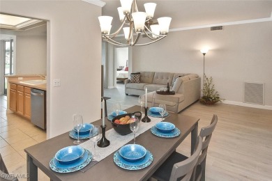 Step into this inviting and pristine first floor waterfront home on Colonial Country Club in Florida - for sale on GolfHomes.com, golf home, golf lot
