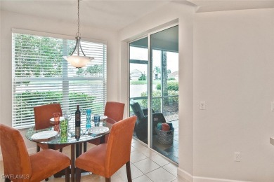 Step into this inviting and pristine first floor waterfront home on Colonial Country Club in Florida - for sale on GolfHomes.com, golf home, golf lot