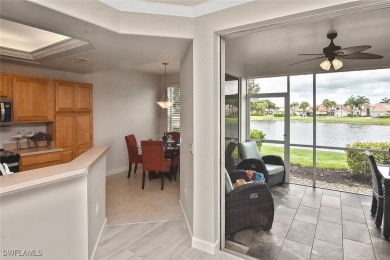 Step into this inviting and pristine first floor waterfront home on Colonial Country Club in Florida - for sale on GolfHomes.com, golf home, golf lot