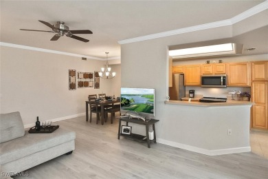 Step into this inviting and pristine first floor waterfront home on Colonial Country Club in Florida - for sale on GolfHomes.com, golf home, golf lot