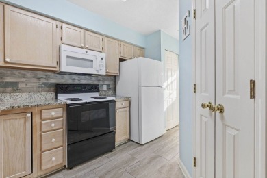 This 2br/2ba, 2nd floor condo not only has a fantastic view from on River Oaks Golf Plantation  in South Carolina - for sale on GolfHomes.com, golf home, golf lot