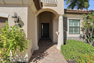 Discover the essence of Naples resort living in this beautifully on The Golf Club At Fiddlers Creek in Florida - for sale on GolfHomes.com, golf home, golf lot