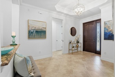 Discover the essence of Naples resort living in this beautifully on The Golf Club At Fiddlers Creek in Florida - for sale on GolfHomes.com, golf home, golf lot