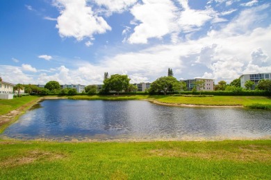 OPEN HOUSE 7/26 2pm-4pm. Waterfront Gem in Gated Toll Brothers on Hillsboro Pines Golf in Florida - for sale on GolfHomes.com, golf home, golf lot