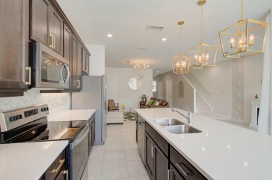 OPEN HOUSE 7/26 2pm-4pm. Waterfront Gem in Gated Toll Brothers on Hillsboro Pines Golf in Florida - for sale on GolfHomes.com, golf home, golf lot