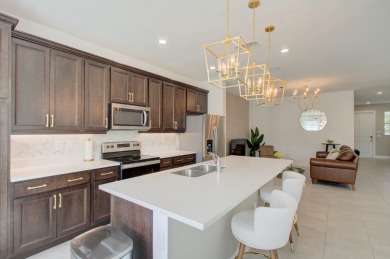 OPEN HOUSE 7/26 2pm-4pm. Waterfront Gem in Gated Toll Brothers on Hillsboro Pines Golf in Florida - for sale on GolfHomes.com, golf home, golf lot