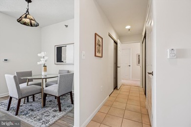 Sky-high living in this top floor condo with 2 spacious bedrooms on Leisure World Golf Club in Maryland - for sale on GolfHomes.com, golf home, golf lot