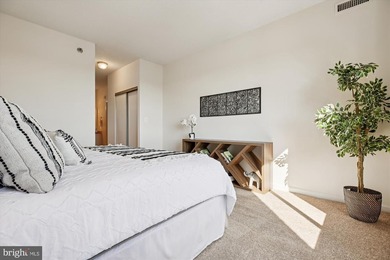 Sky-high living in this top floor condo with 2 spacious bedrooms on Leisure World Golf Club in Maryland - for sale on GolfHomes.com, golf home, golf lot