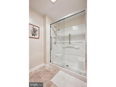 Sky-high living in this top floor condo with 2 spacious bedrooms on Leisure World Golf Club in Maryland - for sale on GolfHomes.com, golf home, golf lot