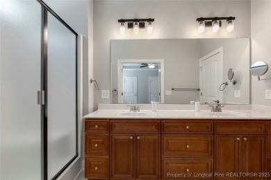 Fabulous home located in the gated and golf community of on Carolina Trace Country Club in North Carolina - for sale on GolfHomes.com, golf home, golf lot
