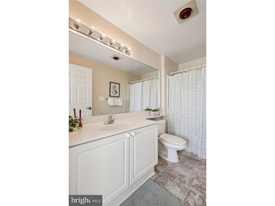 Sky-high living in this top floor condo with 2 spacious bedrooms on Leisure World Golf Club in Maryland - for sale on GolfHomes.com, golf home, golf lot