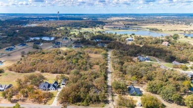 Surrounded by beautiful newer homes, build your dream place and on Sulphur Springs Country Club in Texas - for sale on GolfHomes.com, golf home, golf lot