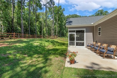 Fabulous home located in the gated and golf community of on Carolina Trace Country Club in North Carolina - for sale on GolfHomes.com, golf home, golf lot