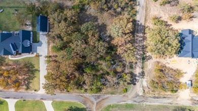 Surrounded by beautiful newer homes, build your dream place and on Sulphur Springs Country Club in Texas - for sale on GolfHomes.com, golf home, golf lot