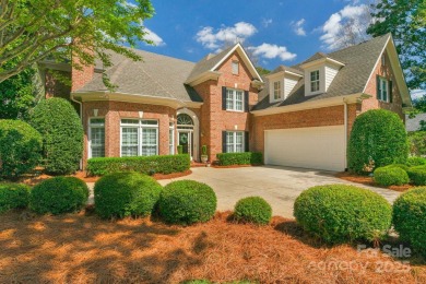 Stunning full-brick estate overlooking Ballantyne Country Club's on Ballantyne Resort and Country Club in North Carolina - for sale on GolfHomes.com, golf home, golf lot
