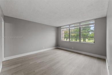 Rarely available! 2 bedroom 2 bathroom unit located in the on Grande Oaks Golf Club in Florida - for sale on GolfHomes.com, golf home, golf lot