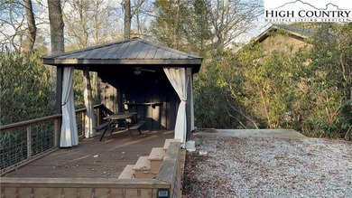 An upgraded RV LOT like no other in Land Harbor. Deck and Bunk on Land Harbor Golf Course in North Carolina - for sale on GolfHomes.com, golf home, golf lot