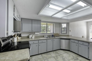 Welcome to this delightful and updated top-floor condo in on The Club At Pelican Bay - North Course in Florida - for sale on GolfHomes.com, golf home, golf lot