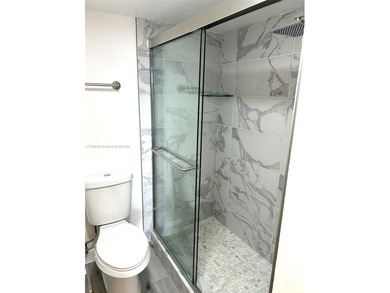 CENTRALLY LOCATED IN THE HEART OF AVENTURA, THIS WELL MAINTAINED on Turnberry Isle Resort and Club in Florida - for sale on GolfHomes.com, golf home, golf lot