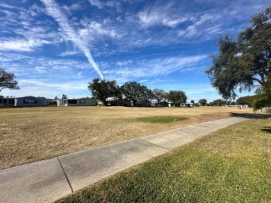 FULLY FURNISHED RETREAT ON 9th FAIRWAY! 2000 Homes of Merit  Lot on Four Lakes Golf Club in Florida - for sale on GolfHomes.com, golf home, golf lot