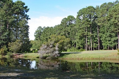 Beautiful Leopard's Chase golf course and pond homesite on Ocean Ridge Plantation in North Carolina - for sale on GolfHomes.com, golf home, golf lot