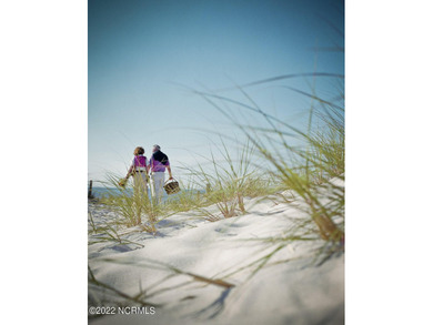 Beautiful Leopard's Chase golf course and pond homesite on Ocean Ridge Plantation in North Carolina - for sale on GolfHomes.com, golf home, golf lot