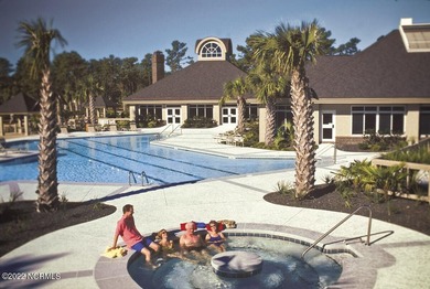 Beautiful Leopard's Chase golf course and pond homesite on Ocean Ridge Plantation in North Carolina - for sale on GolfHomes.com, golf home, golf lot