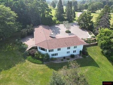 Welcome to this stunning timeless midcentury style home on Shoreland Golf and Tennis Club in Minnesota - for sale on GolfHomes.com, golf home, golf lot