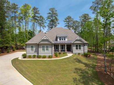 Immaculate like new custom home with four bedrooms all on the on Reynolds Lake Oconee - The Creek Club in Georgia - for sale on GolfHomes.com, golf home, golf lot