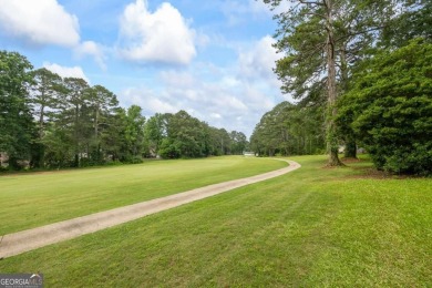 Nestled on hole one of the Honey Creek golf course, 705 on Honey Creek Country Club in Georgia - for sale on GolfHomes.com, golf home, golf lot