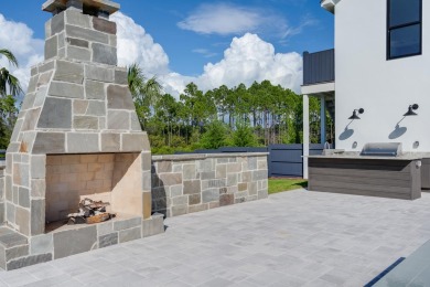 A stunning fusion of modern elegance and sophistication, nestled on Camp Creek Golf Course in Florida - for sale on GolfHomes.com, golf home, golf lot