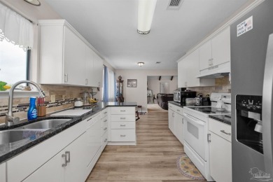 This exceptional golf course home offers a unique opportunity to on Tiger Point Golf and Country Club in Florida - for sale on GolfHomes.com, golf home, golf lot