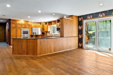 Nestled on 1.2 acres, this property is one of a kind. Priced to on The Wyndgate Golf and Country Club in Michigan - for sale on GolfHomes.com, golf home, golf lot