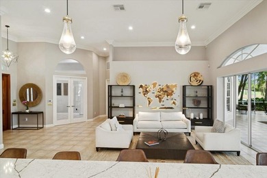 Experience elevated modern living in this fully on The Legacy Golf and Tennis Club in Florida - for sale on GolfHomes.com, golf home, golf lot