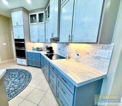 Stunning 3-bedroom 3.5-bathroom lakefront home offers the on South Padre Island Golf Club in Texas - for sale on GolfHomes.com, golf home, golf lot