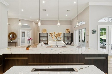 Experience elevated modern living in this fully on The Legacy Golf and Tennis Club in Florida - for sale on GolfHomes.com, golf home, golf lot