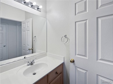 Welcome to a beautifully designed 4-bedroom, 3.5-bath home on Los Lagos Golf Club in Arizona - for sale on GolfHomes.com, golf home, golf lot