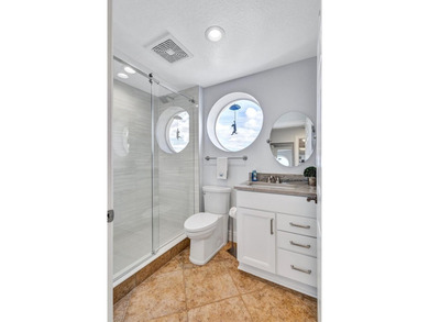 GORGEOUS fully renovated WATERFRONT corner residence in The Bay on Terra Ceia Golf and Country Club in Florida - for sale on GolfHomes.com, golf home, golf lot