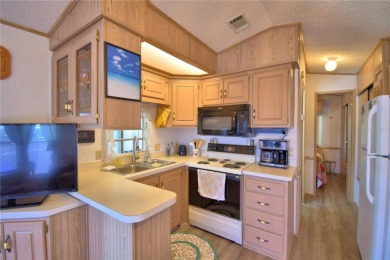 FLORIDA LIFESTYLE AT ITS BEST... GATED 55+COMMUNITY...OWN YOUR on Southern Dunes Golf and Country Club in Florida - for sale on GolfHomes.com, golf home, golf lot