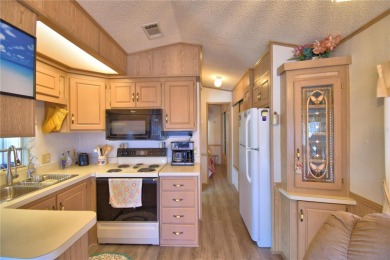 FLORIDA LIFESTYLE AT ITS BEST... GATED 55+COMMUNITY...OWN YOUR on Southern Dunes Golf and Country Club in Florida - for sale on GolfHomes.com, golf home, golf lot