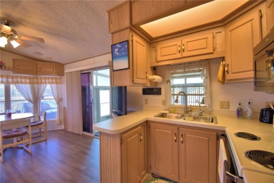 FLORIDA LIFESTYLE AT ITS BEST... GATED 55+COMMUNITY...OWN YOUR on Southern Dunes Golf and Country Club in Florida - for sale on GolfHomes.com, golf home, golf lot