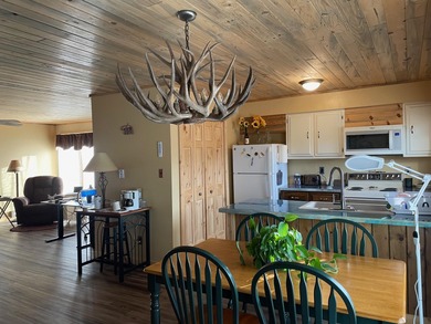 This newly remodeled, upper-level condominium offers a private on Antelope Hills Golf Course in Wyoming - for sale on GolfHomes.com, golf home, golf lot