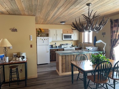 This newly remodeled, upper-level condominium offers a private on Antelope Hills Golf Course in Wyoming - for sale on GolfHomes.com, golf home, golf lot