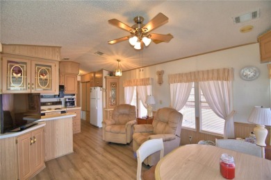 FLORIDA LIFESTYLE AT ITS BEST... GATED 55+COMMUNITY...OWN YOUR on Southern Dunes Golf and Country Club in Florida - for sale on GolfHomes.com, golf home, golf lot
