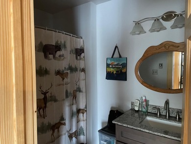 This newly remodeled, upper-level condominium offers a private on Antelope Hills Golf Course in Wyoming - for sale on GolfHomes.com, golf home, golf lot