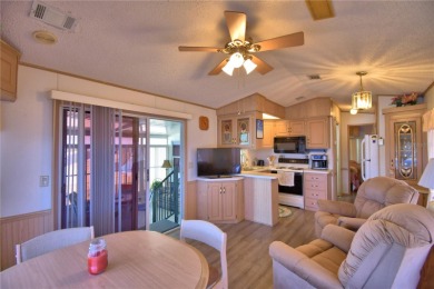 FLORIDA LIFESTYLE AT ITS BEST... GATED 55+COMMUNITY...OWN YOUR on Southern Dunes Golf and Country Club in Florida - for sale on GolfHomes.com, golf home, golf lot