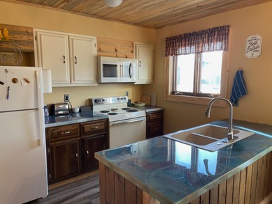 This newly remodeled, upper-level condominium offers a private on Antelope Hills Golf Course in Wyoming - for sale on GolfHomes.com, golf home, golf lot