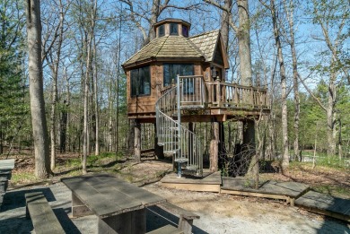 Nestled on 1.2 acres, this property is one of a kind. Priced to on The Wyndgate Golf and Country Club in Michigan - for sale on GolfHomes.com, golf home, golf lot