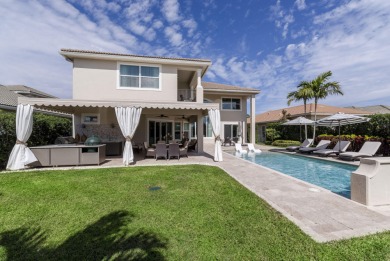 Step into luxury and sophistication as you enter this exquisite on Jupiter Country Club in Florida - for sale on GolfHomes.com, golf home, golf lot