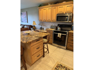 Completely refurbished top floor ocean view 1/1 at Villas III on Ocean Village Golf Course in Florida - for sale on GolfHomes.com, golf home, golf lot